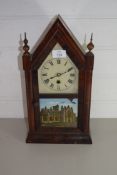 CLOCK IN WOODEN ARCHED CASE