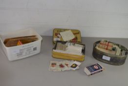 TIN CONTAINING CIGARETTE CARDS