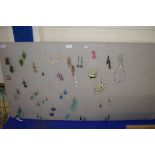 LARGE BOARD WITH QTY OF MAINLY COSTUME JEWELLERY EARRINGS ATTACHED