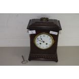 MANTEL CLOCK IN OAK CASE WITH SILVERED DIAL