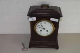 MANTEL CLOCK IN OAK CASE WITH SILVERED DIAL