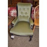 LATE VICTORIAN GREEN UPHOLSTERED ARMCHAIR WITH EBONISED FRAME