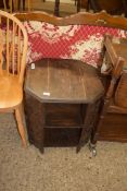 EARLY 20TH CENTURY OCTAGONAL OAK OCCASIONAL TABLE WITH TWO BASE SHELVES, 51CM WIDE