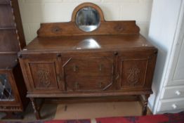 EARLY 20TH CENTURY OAK SIDEBOARD WITH TWO DOORS AND TWO DRAWERS RAISED ON BARLEY TWIST LEGS, 136CM