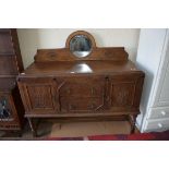 EARLY 20TH CENTURY OAK SIDEBOARD WITH TWO DOORS AND TWO DRAWERS RAISED ON BARLEY TWIST LEGS, 136CM