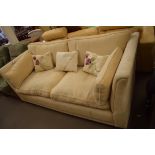 CREAM UPHOLSTERED THREE SEATER SOFA WITH LOOSE CUSHIONS