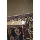CAUCASIAN WOOL FLOOR RUG WITH LARGE RED AND BLUE CENTRAL MEDALLION, 190CM LONG