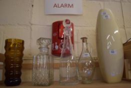 MIXED LOT: THREE DECANTERS, ART GLASS VASE AND A POTTERY VASE (5)