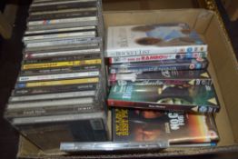 BOX OF MIXED CDS AND DVDS