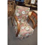 EARLY 20TH CENTURY OAK FRAMED ARMCHAIR WITH FLORAL UPHOLSTERY, 61CM WIDE