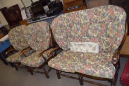 ERCOL STYLE DARK WOOD FRAMED TWO SEATER SOFA AND PAIR OF ARMCHAIRS