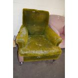 LARGE VICTORIAN DEEP SEATED ARMCHAIR, RAISED ON TURNED WOODEN LEGS AND CASTERS, SOLD FOR RE-