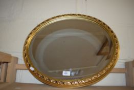 MODERN OVAL BEVELLED WALL MIRROR IN GILT FINISH FRAME, 56CM HIGH