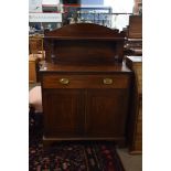 George IV mahogany chiffonier, the back with single shelf and turned column supports over a base