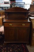 George IV mahogany chiffonier, the back with single shelf and turned column supports over a base