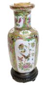 Chinese Cantonese porcelain vase mounted on wooden base decorated in famille rose style with