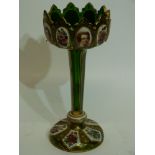 Table lustre, the green glass with alternating designs of flowers and figures, 27cm high