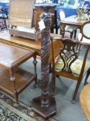 Late 19th/early 20th century turned hardwood torchere plant stand, the stem decorated with foliate