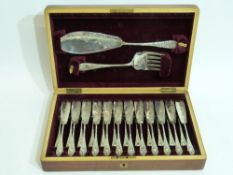Mahogany cased set of 12 silver plated Fish Eaters and matching Servers