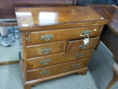 Reproduction Georgian mahogany bachelor's chest of small proportions, the hinged top over a body