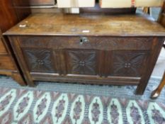 18th century oak coffer of typical form, hinged lid opening to a void interior, the front