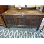 18th century oak coffer of typical form, hinged lid opening to a void interior, the front