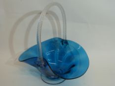 Large glass basket with blue glass bowl and clear air twist effect glass handle