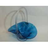 Large glass basket with blue glass bowl and clear air twist effect glass handle