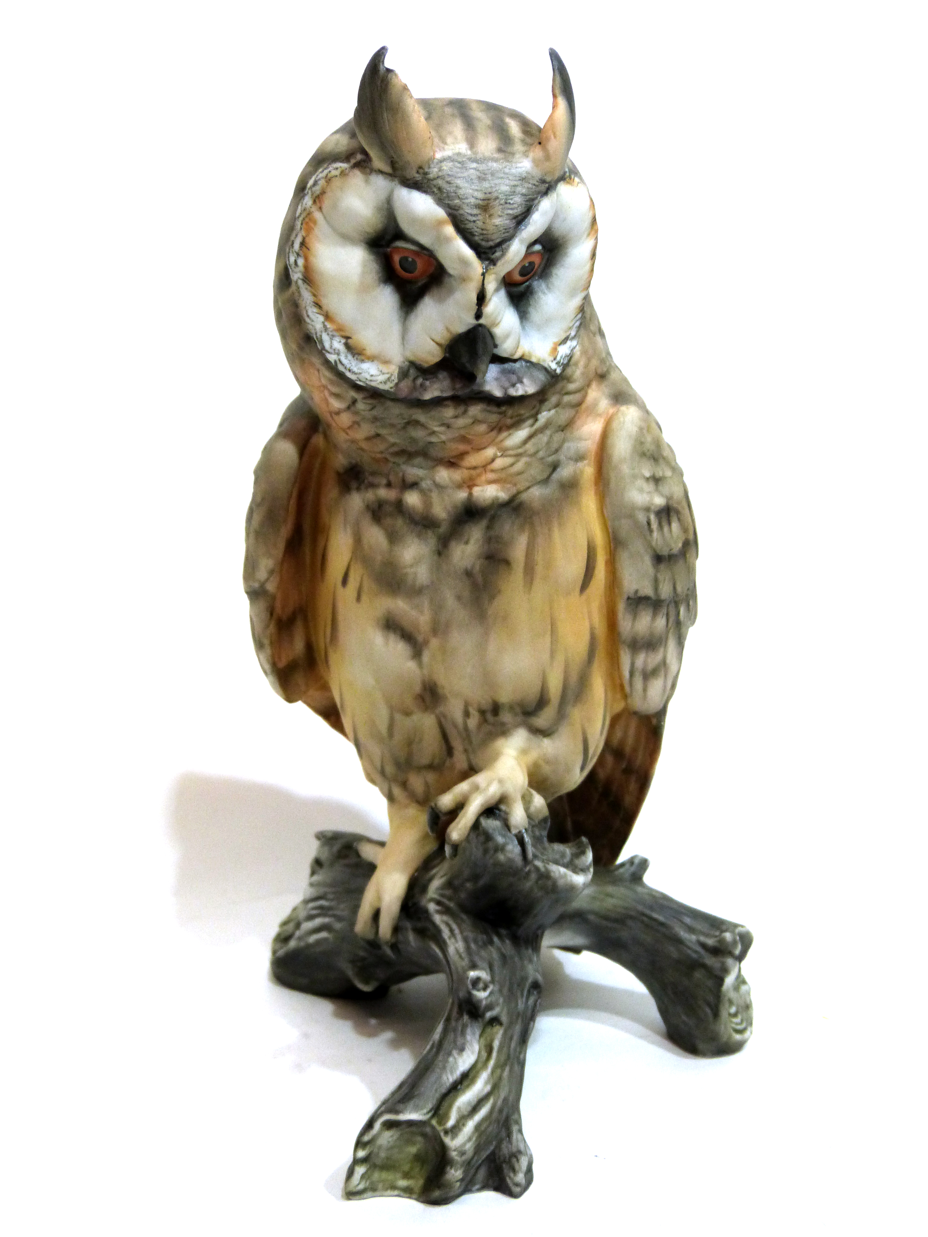 Kaiser porcelain model of an owl standing on a tree stump, 22cm high