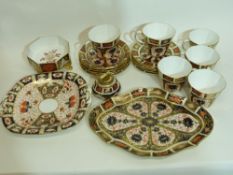 Group of Royal Crown Derby wares in Kings pattern comprising cups and saucers, small dish on