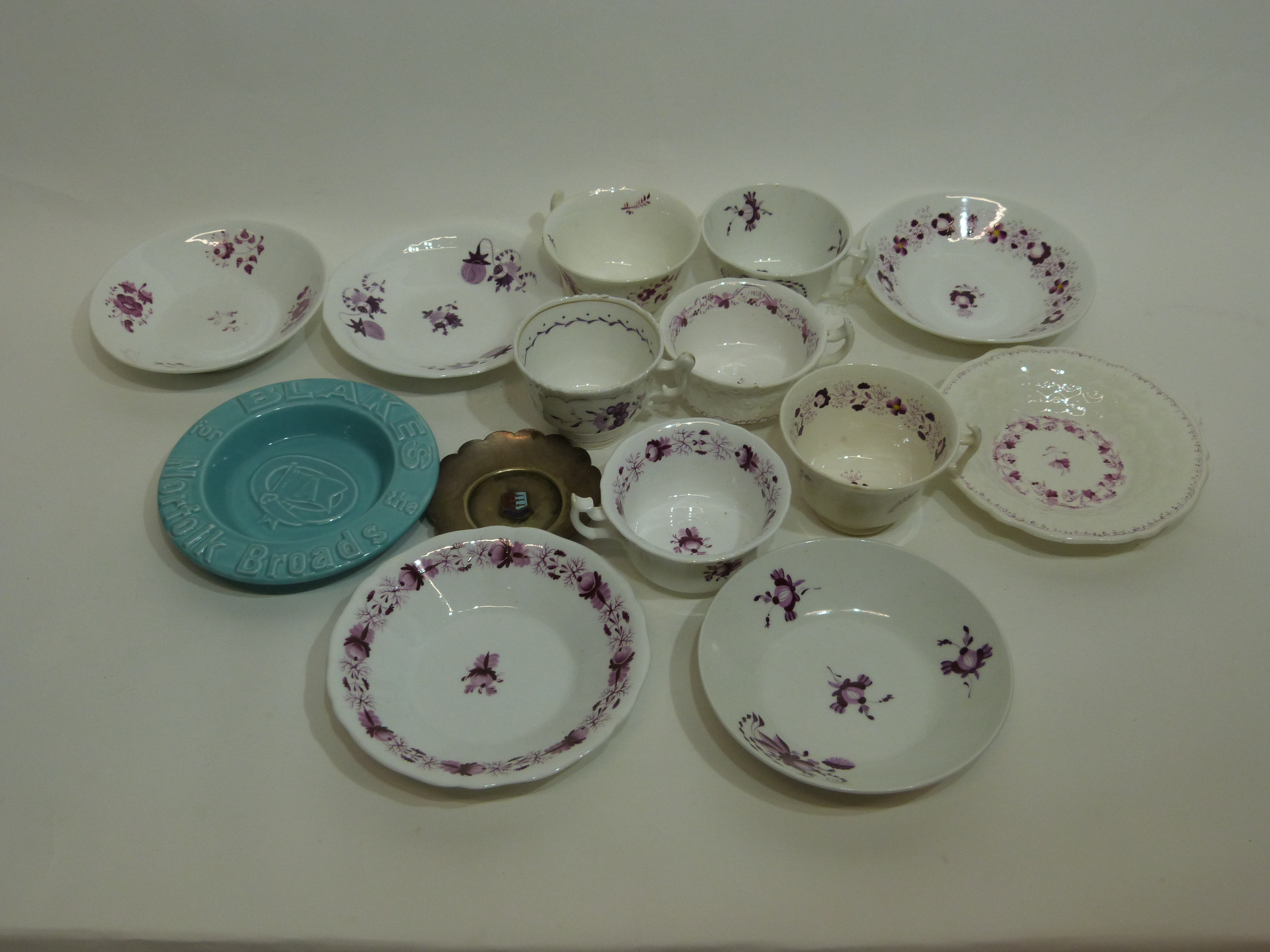 Quantity of Victorian tea wares with a design of purple flowers, together with a small metal dish