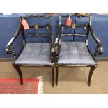 Pair of Regency ebonised and brass mounted side chairs with scrolled arms, cabriole legs and