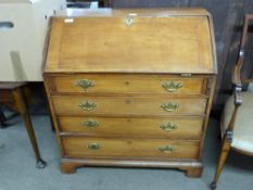 George III faded mahogany bureau with fall front opening to a shelved interior over four long