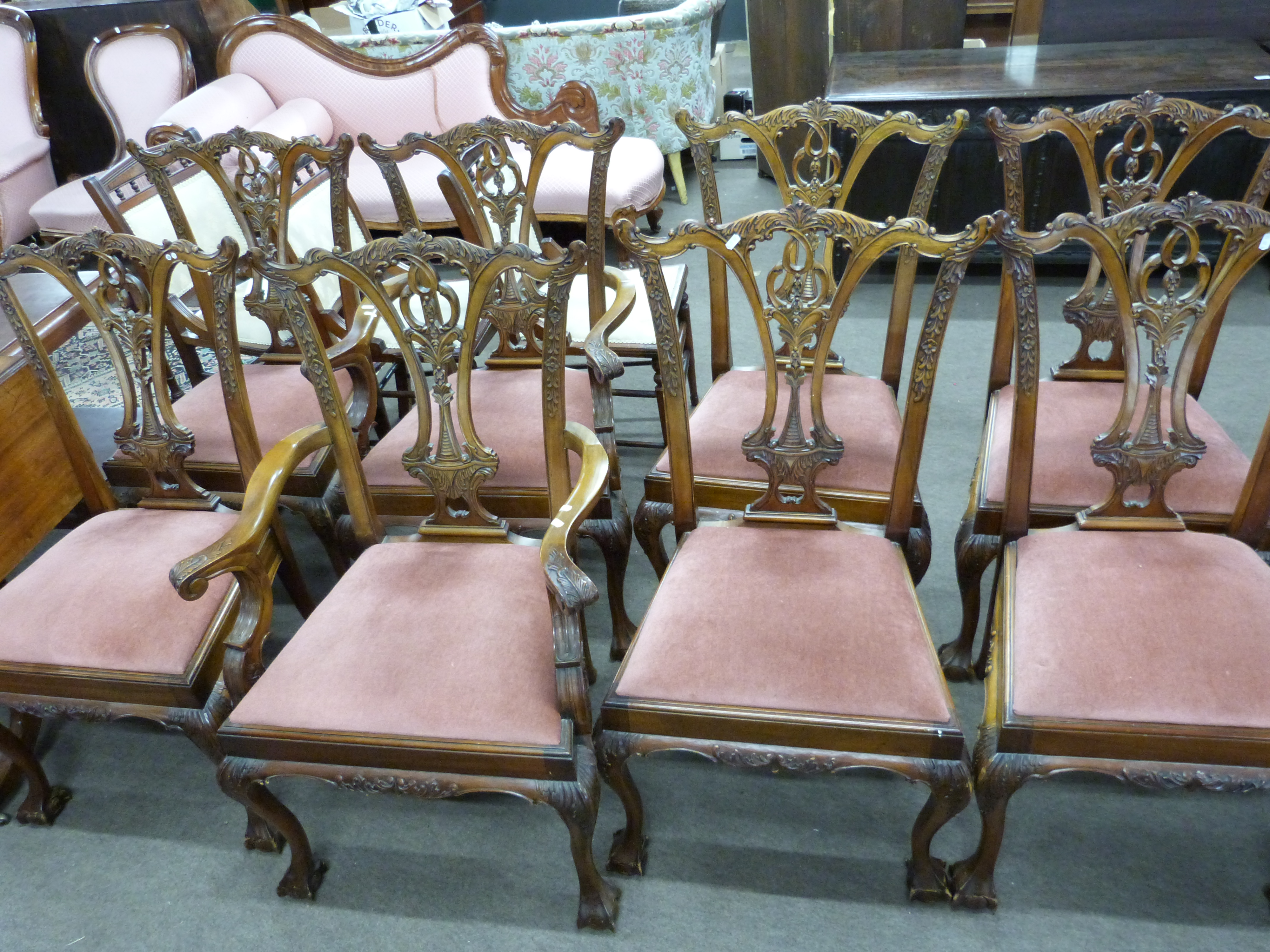 Set of eight reproduction Chippendale style dining chairs, comprising two carver chairs and six