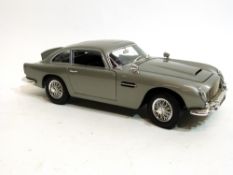 Model of an Aston Martin car, in silver livery