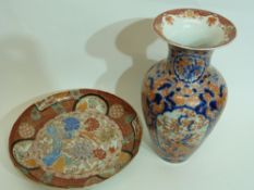 Japanese Imari porcelain vase together with a Japanese porcelain dish decorated in Imari style,