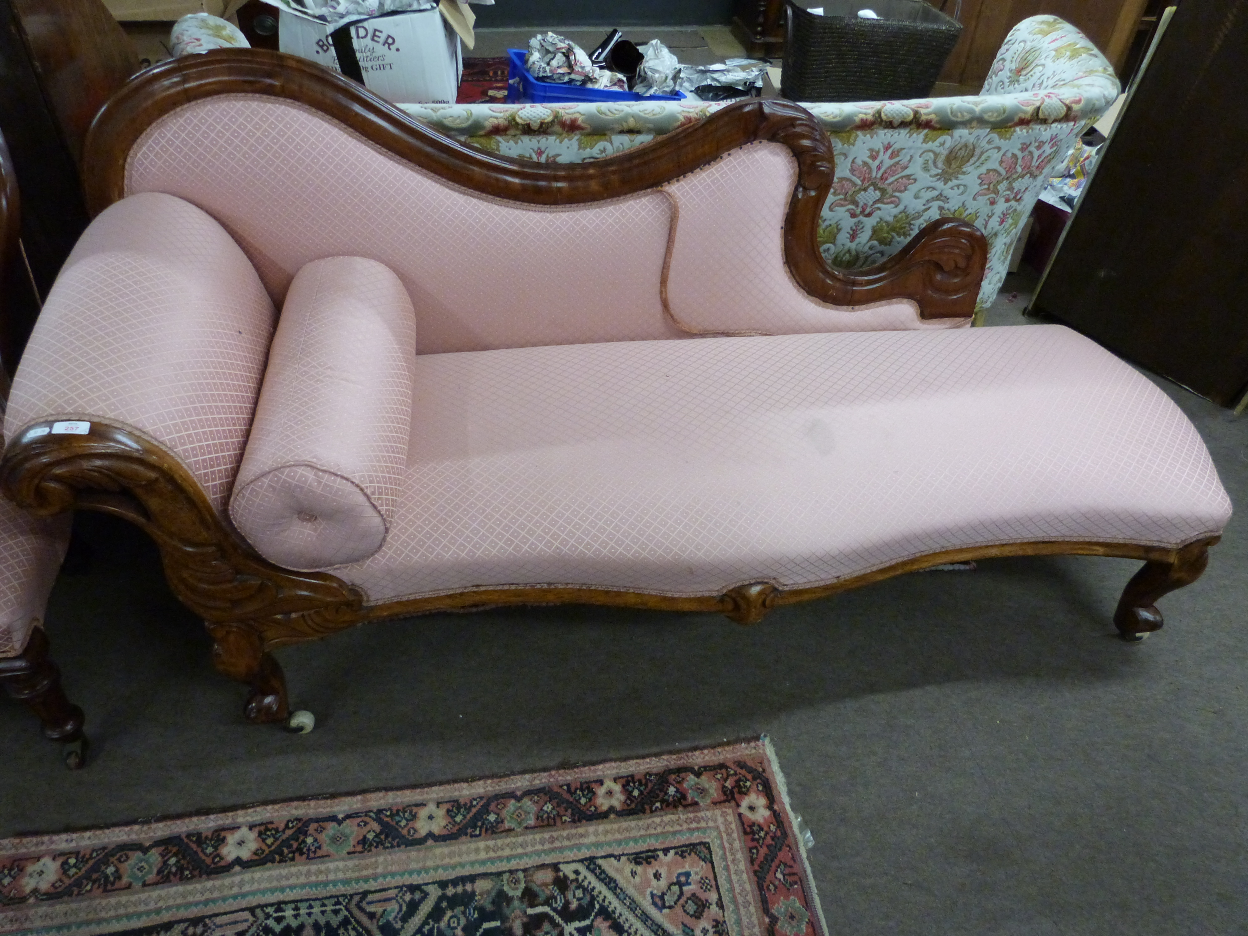 Victorian mahogany framed chaise longue with shaped back and carved Showood frame, raised on short