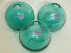 Three glass balls with Murano label