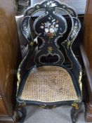 Victorian black lacquer and mother of pearl inlaid side chair, with cane seat, raised on cabriole