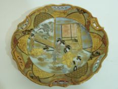Japanese porcelain plate decorated with a gilt design with geishas to interior within a gilt