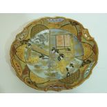 Japanese porcelain plate decorated with a gilt design with geishas to interior within a gilt