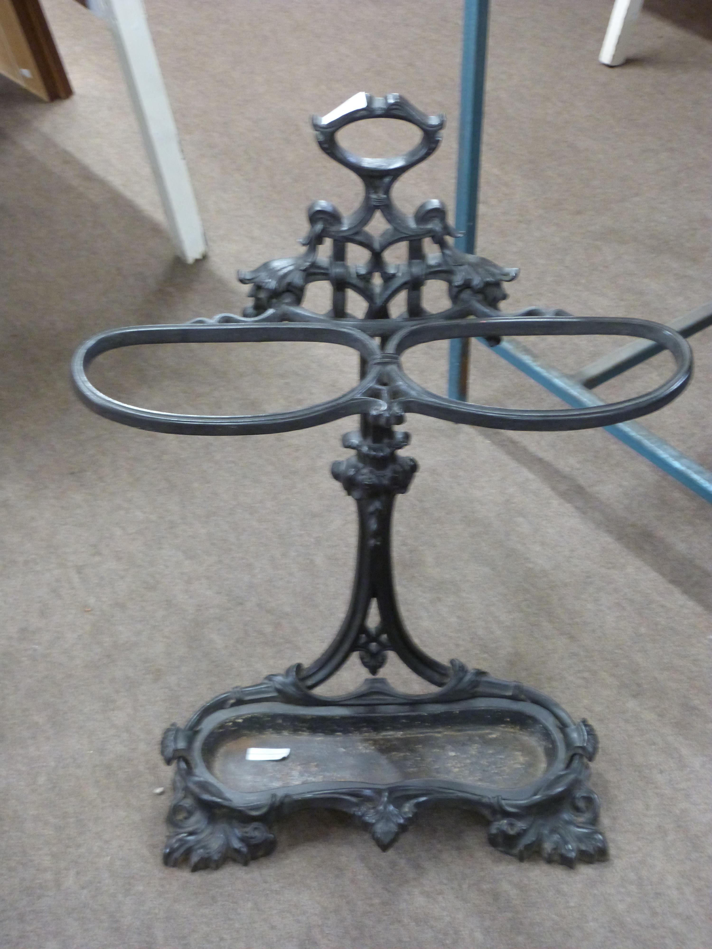 Victorian cast iron stick stand of foliate form fitted with removable drip tray, 76cm high