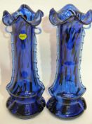 Pair of blue glass vases with trailing design in relief to either side, bearing label "Murano Italy"