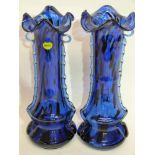 Pair of blue glass vases with trailing design in relief to either side, bearing label "Murano Italy"