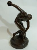 Bronzed figure of a discus thrower on circular base