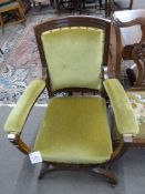 Late 19th century oak framed chair with green upholstery and X-formed base, 61cm wide