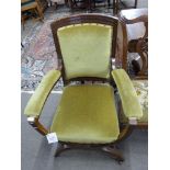 Late 19th century oak framed chair with green upholstery and X-formed base, 61cm wide