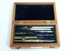Vintage mahogany cased students drawing set, the pull out top tray/ blue velvet lined and fitted