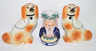 Two Staffordshire type dogs and further Staffordshire Toby jug (3)