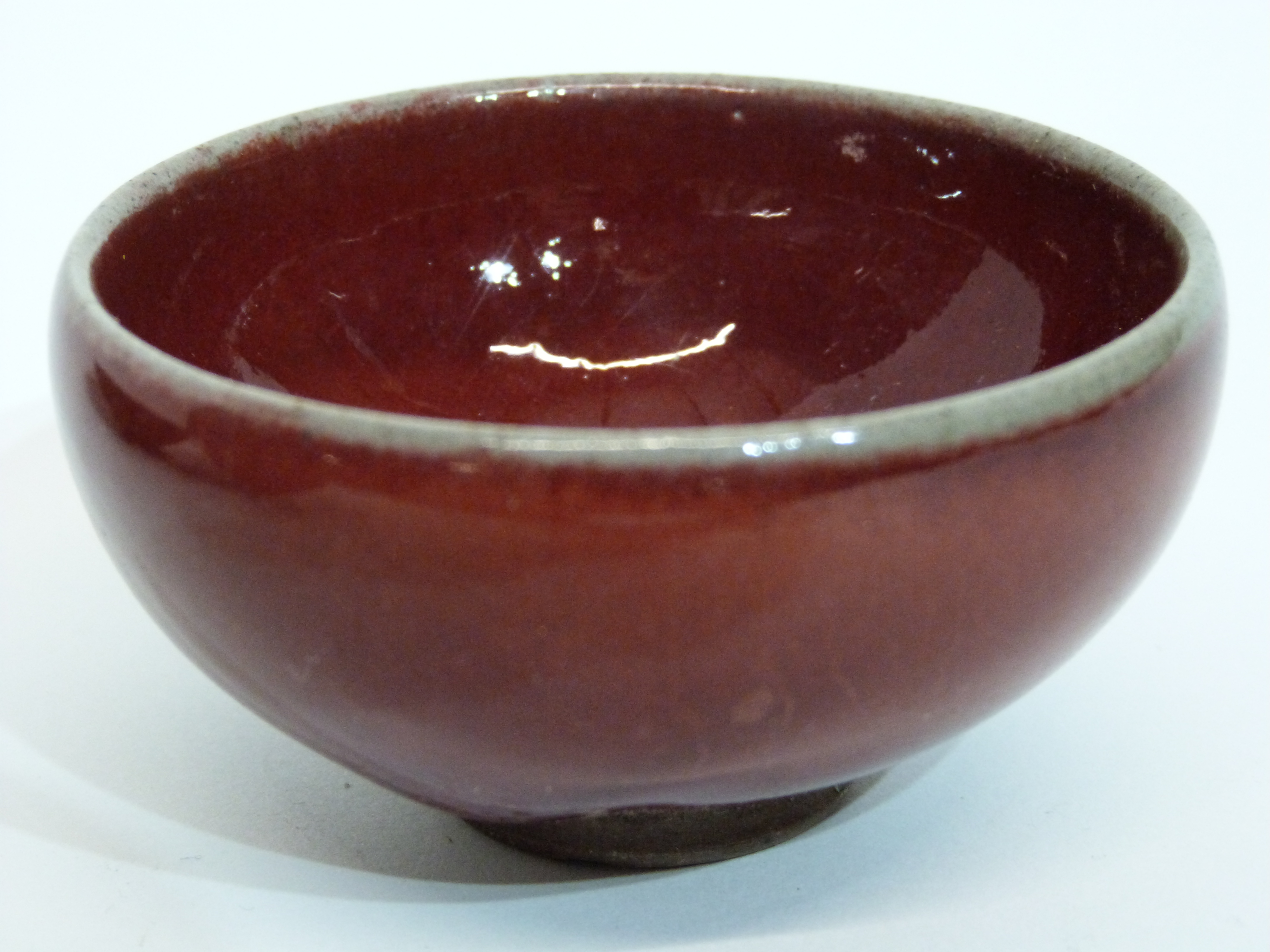 Group of small Oriental bowls with a flambe glaze and further bronze bowl decorated in relief with - Image 2 of 9